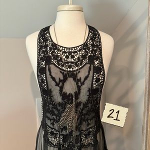 Long feather necklace.